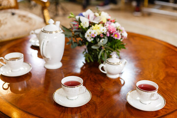 Christmas metal garland of stars. Glitter balls for Christmas tree in a wooden box