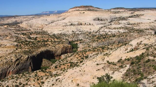 View of Lower Calf Creek in the Escalante Grand Staircase National Monument. Camera viewpoint is along the Hogback; a scenic byway along Utah Highway 12.  Camera panning right to left.