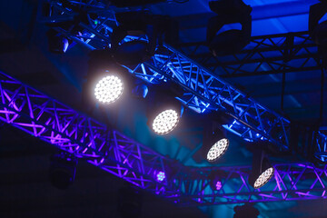 A bright light in front of a stage