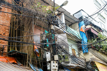 Communication and electrical wires in the French Quarter of Hanoi Vietnam
