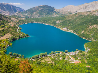 Fototapeta na wymiar Stunning view of the heart-shaped Scanno lake, the most famous and romantic lake in Abruzzo national Park, central Italy 
