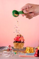 Cupcake with cream and Sprinkles Sugar colorful .Beautiful and delicious cupcake.