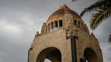 Obraz premium Gray Cloudy Skies Behind the Monument to the Revolution