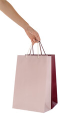 Woman with paper shopping bags on white background, closeup