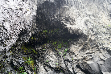 Basalt Halsanefshellir Cave with basalt sea stacks situated under the mountain Reynisfjall near the village Vik i Myrdal, southern Iceland which is framed by a black sand beach. 2020