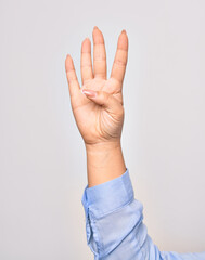 Hand of caucasian young woman showing number four with streched fingers raised up over isolated white background