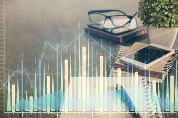 Double exposure of forex chart drawing and cell phone background. Concept of financial trading