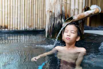 Young boy in hot water