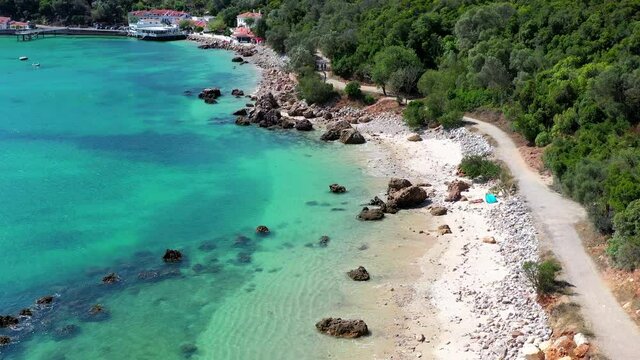 Aerial Views of Portinho da Arr&aacute;bida, Creiro Beach and Turquoise Atlantic Coast in Portugal