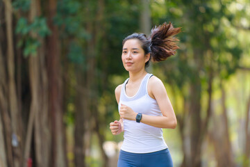 Young woman running in a park