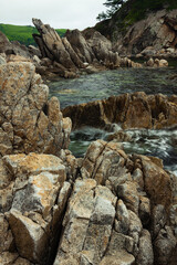Rock and the sea, the rocky coastline, the Bay Telyakovsky Primorsky Krai, Russia.
