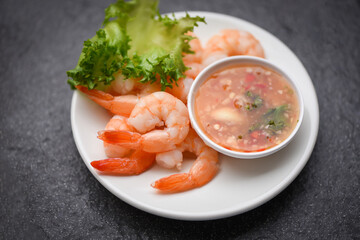 Shrimp delicious seasoning spices on white plate appetizing cooked boiled shrimps prawns , salad shelfish seafood sauce /