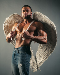 Muscular guy with angel wings and sexy torso.