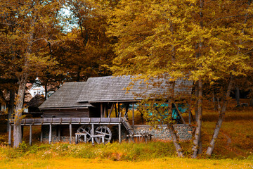 water mill and fountain with scale in the farm yard