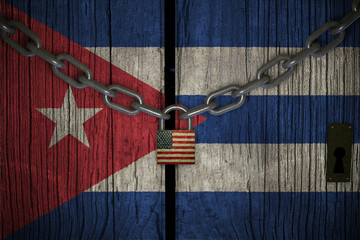 Flag of Cuba painted on old and cracked wooden door, which is closed by an old chain and a padlock. Concept of the economic sanctions of the United States of America to Cuba government 3d render. - obrazy, fototapety, plakaty