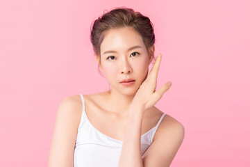 Beautiful young asian woman with clean fresh skin on pink background, Face care, Facial treatment, Cosmetology, beauty and spa, Asian women portrait
