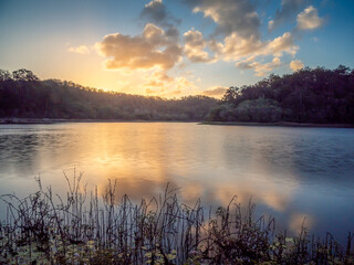 Beautiful Lakeside Sunset with Cloud Reflections