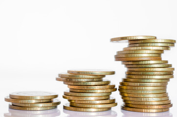 gold coin stack row growing pile on white background for money saving and investment business financial and banking concept.