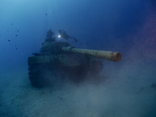 scuba diver exploring tank wreck underwater wreck dive blue water kas turkey
