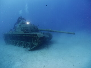 scuba diver exploring tank wreck underwater wreck dive blue water kas turkey