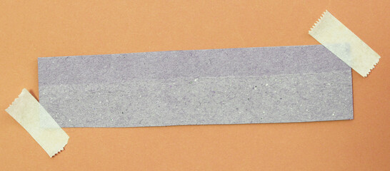 torn paper with adhesive tape with space for your message