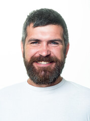 Fototapeta premium Bearded man. Happy man smile face. Handsome smiling young guy. Barber with long beard and moustache in barbershop. Positive human facial expressions and emotions.