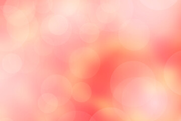 Abstract blurry image of light and pink bokeh background.