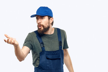 Worker man uniform delivery service emotions studio light background