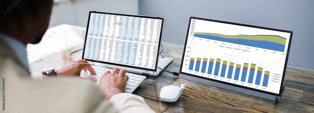 Aufkleber analyst working with spreadsheet data