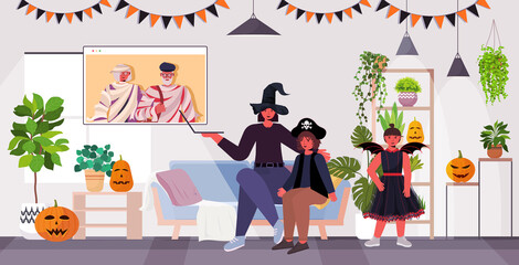happy halloween holiday celebration concept family in costumes discussing with grandparents during video call online communication self isolation living room interior horizontal vector illustration