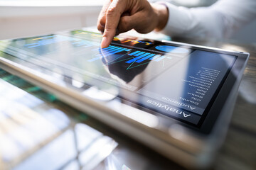 African Analyst Man Pointing At KPI Graph