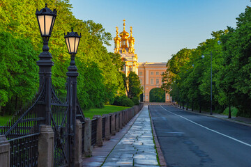 Saint Petersburg. Russia. City of Pushkin. Road and temple in Tsarskoye Selo. Street leads to...