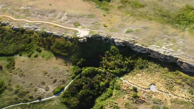 Aerial: Head-Smashed-In Buffalo Jump near Fort Macleod Alberta