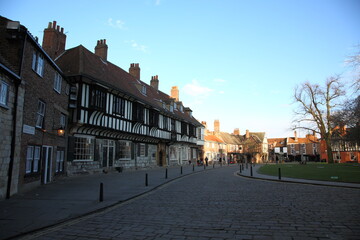View of St williams college ancient building  and college street during early Spring in York,  Yorkshire, England, UK