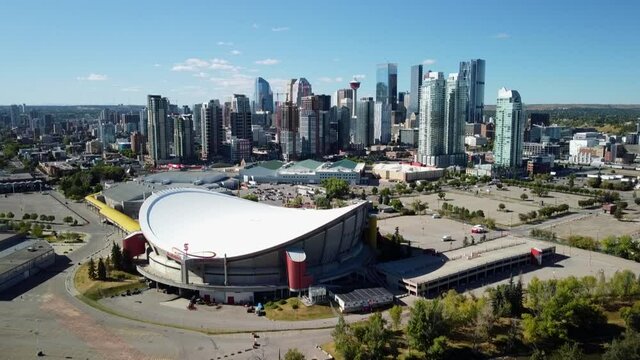 Forward Tracking Aerial Angle Of The Calgary Skyline And Saddledome