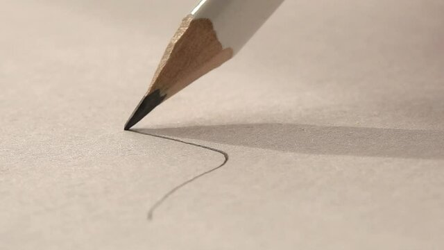 Pencil drawing, artist, designer draw sketches on paper, creativity, art, drawing lessons concept, extreme close up view.