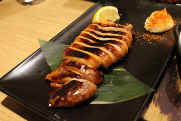 Grilled squid or fish or seafood served at izakaya
