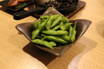Boiled edamame beans served at izakaya
