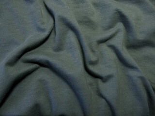 Dark green cotton velvet fabric as background