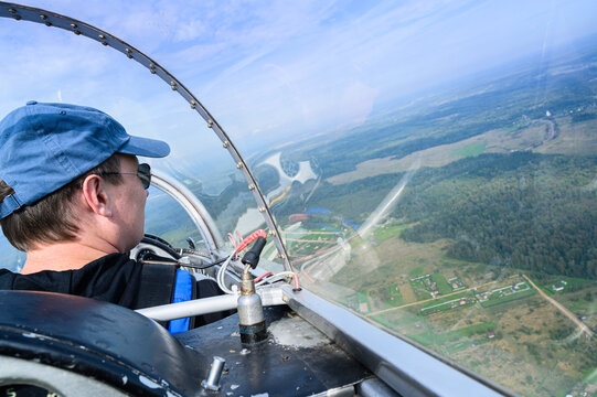 view in the cockpit behind the pilot during the flight