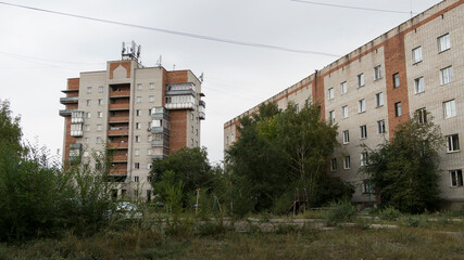 Fototapeta na wymiar Residential area. Brick buildings. Modern architecture. Ust-Kamenogorsk (Kazakhstan)