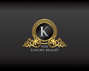 Gold Luxury Brand Letter K Elegant Logo Badge. Golden Letter Initial Crest, Wreath and Crown Monogram Design Vector.