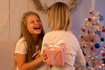 Mom gave her daughter a gift for the new year