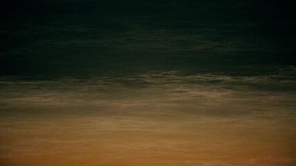 Beach at night animation: tranquil sandy beach and gentle dark ocean waves. Looping, full hd motion background.