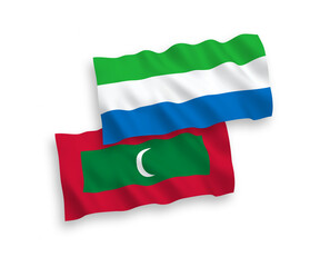 Flags of Maldives and Sierra Leone on a white background