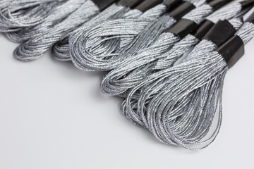 skeins of silver embroidery threads