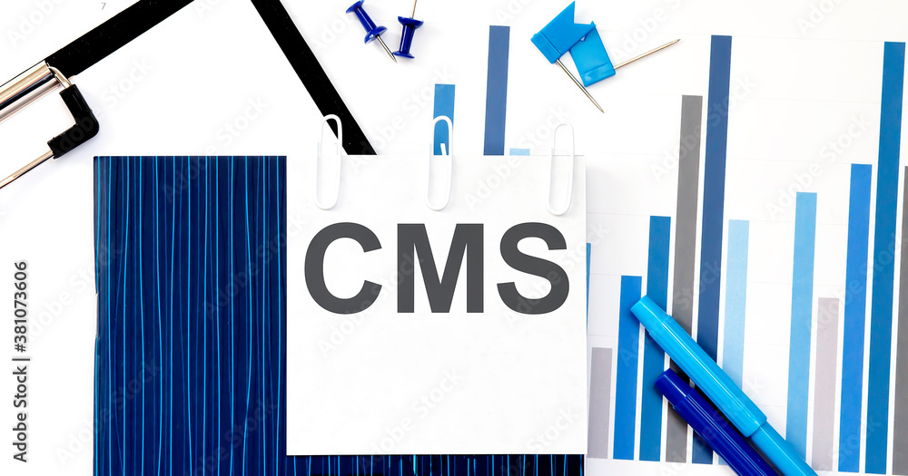 Poster notebook with toolls and notes about cms on sticker ,concept