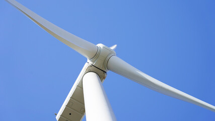 Wind turbine close up from the bottom up, modern technology wind power plant