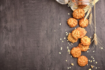 Oatmeal cookies and milk on a background with place for text. Healthy breakfast concept.