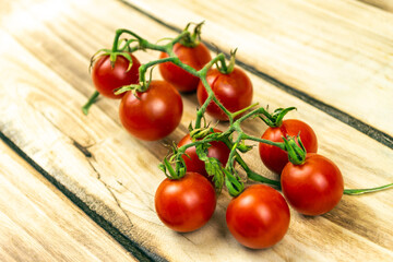 Tomatoes on wood background